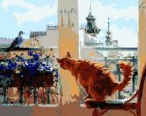 Рыжий кот на балконе с цветами